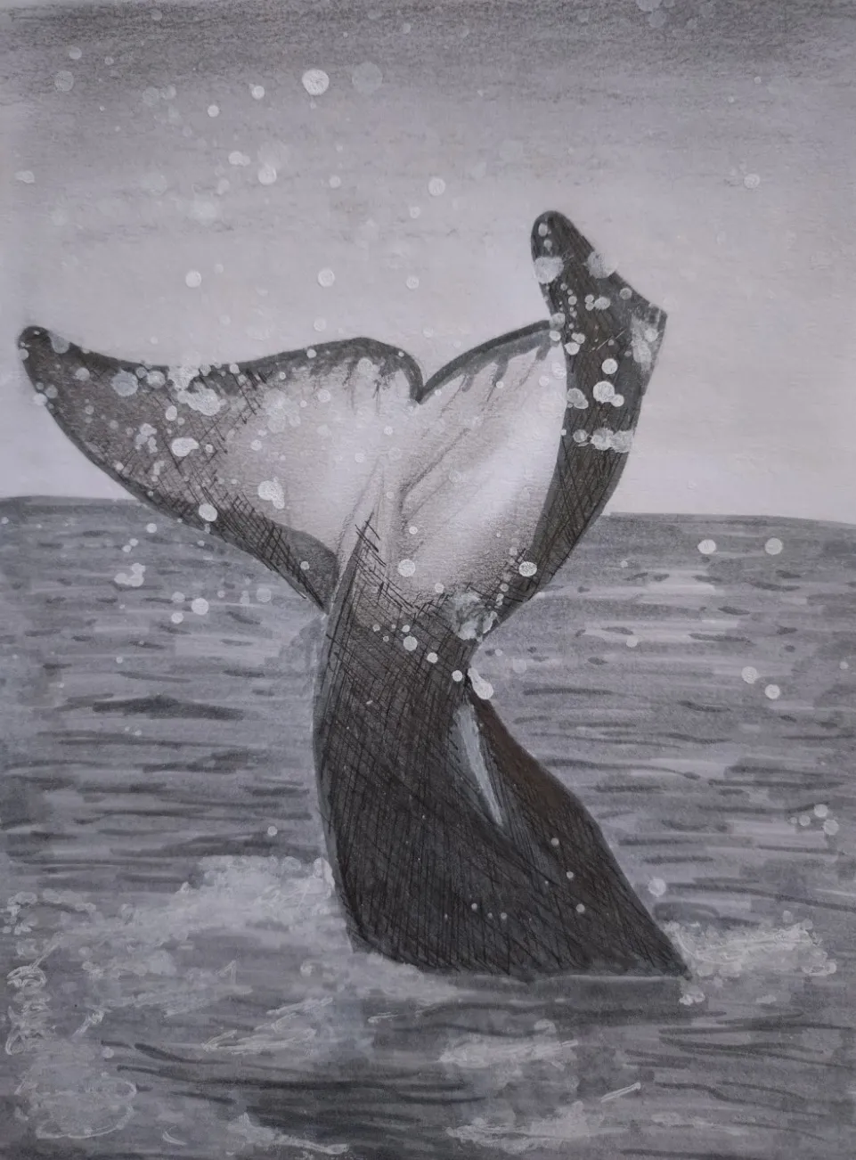Illustration d'une queue de baleine dans la mer